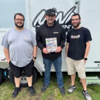 Tommy receiving his copy of Mini Truckin' Magazine featuring his collection